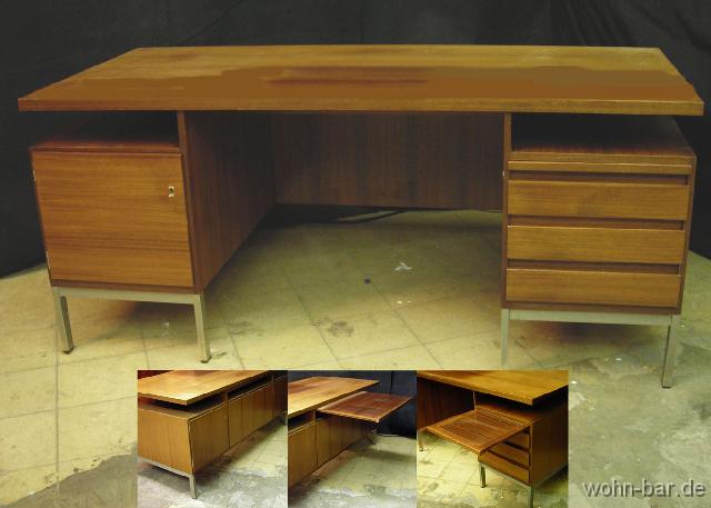 70erschreibtisch grosser, sehr funktionaler schreibtisch,<br>
anfang 70er jahre,schnes nussbaumfurnier, chromfussgestell,<br>zwei zustzliche auszieharbeitsflchen, auf der rckseite ebenfalls tren,<br>b 170cm, t 80cm, h 75cm,<br>
400,- euro
